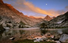 Full Moon Rising at Sunset Over Evolution Lake - California