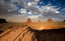 A Building Sandstorm Behind the Two Mittens - Monument Va... - Utah